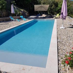 Maisons de vacances Maison de 2 chambres avec piscine partagee et jardin amenage a Saint Julien de la Nef : photos des chambres