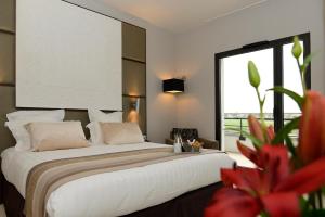 Hotels Kyriad Prestige Lyon Est - Saint Priest Eurexpo Hotel and SPA : photos des chambres