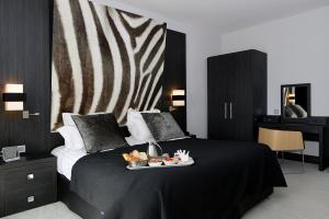 Hotels Kyriad Prestige Lyon Est - Saint Priest Eurexpo Hotel and SPA : photos des chambres