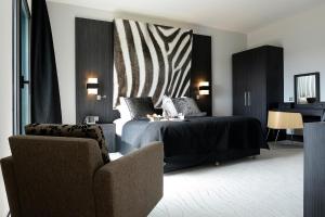 Hotels Kyriad Prestige Lyon Est - Saint Priest Eurexpo Hotel and SPA : photos des chambres