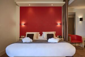 Hotels Kyriad Prestige Lyon Est - Saint Priest Eurexpo Hotel and SPA : photos des chambres