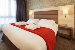 Hotels Kyriad Prestige Lyon Est - Saint Priest Eurexpo Hotel and SPA : photos des chambres