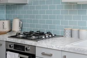 Spacious 4BR Home with outdoor seating in Swansea