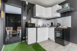 Appartements L’Eden, appartement privatif avec balneo : photos des chambres