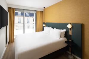 Hotels Residence Inn by Marriott Paris Didot Montparnasse : Suite King 1 Chambre avec Balcon