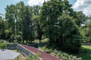 Maisons de vacances Le Verdier - Charmante maison pour 10 avec jardin : Maison 4 Chambres