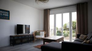 Appartements Appartement avec jardin BELLADONA : photos des chambres