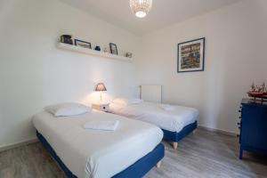 Appartements Ziburu Mendi - Appartement Calme, Vue Mer, Parking - WiFi : photos des chambres