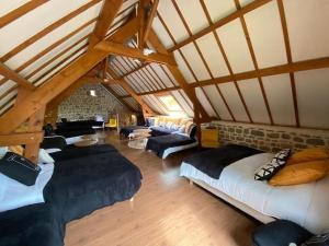 Maisons de vacances Moulin du Gast 35pers SPA Billard Baby-foot : photos des chambres