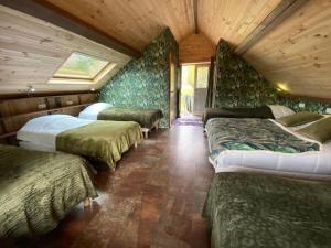 Maisons de vacances Moulin du Gast 35pers SPA Billard Baby-foot : photos des chambres