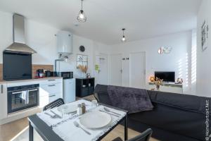 Appartements La Vie est belle : photos des chambres