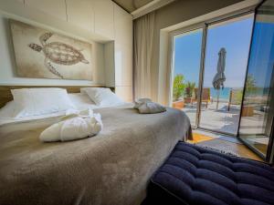 Appartements La Maison Regent & spa face a la mer : photos des chambres