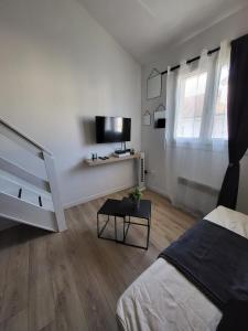 Appartements REGLISSE-12 min des parcs Walt Disney-Arrivee Autonome - Parking & wifi Gratuit : photos des chambres