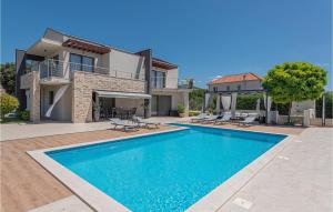 Nice Home In Dubrava Kod Sibenika With 4 Bedrooms, Wifi And Outdoor Swimming Pool