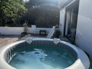 Maisons de vacances Maisonnette 32m2 climatise avec jacuzzi au calme. : photos des chambres
