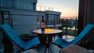 White and Bright Riverside View Flat with Parking, Bike Access, and Onsite Gym