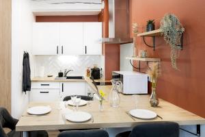 Appartements Le Constantin • Ecrin chaleureux & confortable : photos des chambres