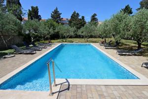 Family friendly apartments with a swimming pool Novalja, Pag - 213