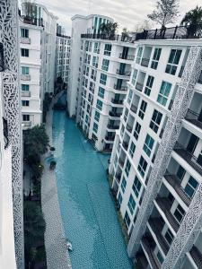 Olympus city garden condominium 1st floor with direct access from balcony to swimming pool