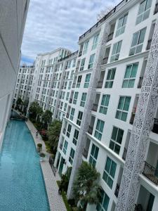 Olympus city garden condominium 1st floor with direct access from balcony to swimming pool