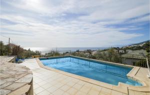 Maisons de vacances Beautiful Home In Brando With Outdoor Swimming Pool, Wifi And 4 Bedrooms : photos des chambres