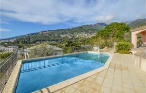 Maisons de vacances Beautiful Home In Brando With Outdoor Swimming Pool, Wifi And 4 Bedrooms : photos des chambres