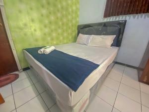 Guest House Hj Muriyah Syariah Slawi Mitra RedDoorz