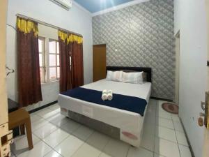 Guest House Hj Muriyah Syariah Slawi Mitra RedDoorz