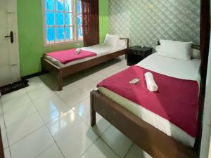 Guest House Hj Muriyah Syariah Slawi Mitra RedDoorz