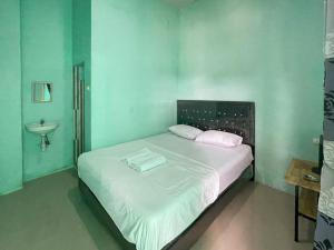 Antony Homestay near Pantai Pasir Putih Parbaba Mitra RedDoorz