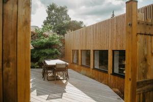 Maisons de vacances Grand loft avec Jacuzzi et Home Cinema : photos des chambres