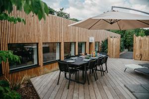 Maisons de vacances Grand loft avec Jacuzzi et Home Cinema : photos des chambres