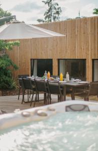 Maisons de vacances Grand loft avec Jacuzzi et Home Cinema : photos des chambres