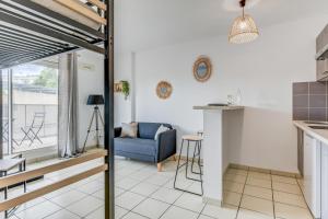 Appartements Le Marigny - Studio avec piscine partagee : photos des chambres