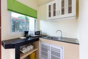 RAWAÏ Bedroom and kitchen