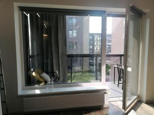 Erdvi studija Spacious studio apartment Self check in