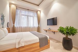 Phòng Loại Sang có Giường Lớn - Cấm Hút Thuốc (Deluxe Room with King Bed - Non-Smoking)