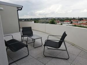 Appartements Vue sur la ville et le ciel : photos des chambres