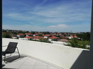 Appartements Vue sur la ville et le ciel : photos des chambres