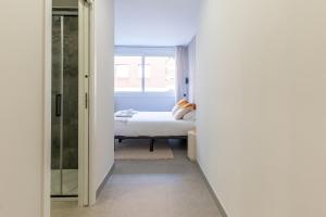 Housing Muelle Uno by SharingCo