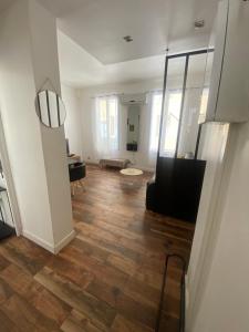 Appartements Grand T2 en Rez-de-jardin et petite place de parking : photos des chambres