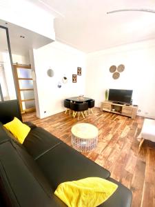 Appartements Grand T2 en Rez-de-jardin et petite place de parking : photos des chambres