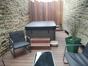 Appartements Charmant logement avec jacuzzi : photos des chambres