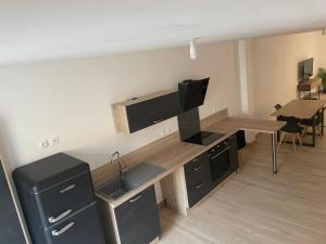 Appartements Appartement centre ville - Sable sur Sarthe : photos des chambres