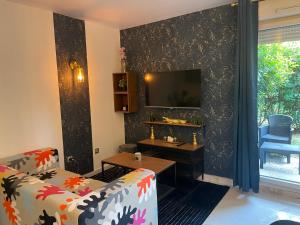 Appartements Studio cosy Cergy prefecture : photos des chambres