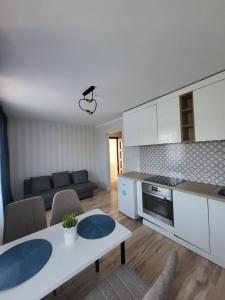 SKY BLUE LOQUS Studia i Apartmenty