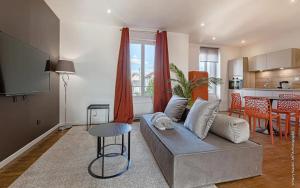 Appartements Suites proches gare avec parking : photos des chambres