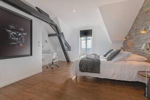 Appartements Suites proches gare avec parking : photos des chambres