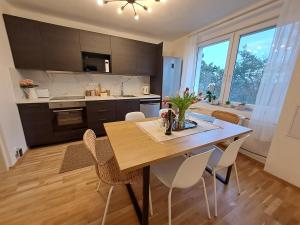 Apartmánový dům se zahradou v klidné části Prahy