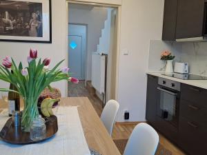 Apartmánový dům se zahradou v klidné části Prahy